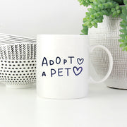Adopt A Pet with Green Galaxy font Mugs