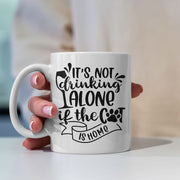 alone if the cat Coffee Mug